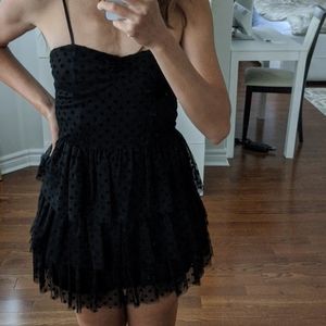Black polka dot dress w/ layered bottom.
